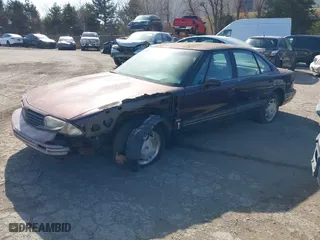 1995 Oldsmobile 88 with VIN 1G3HN52K1S4815982, listed as a IAAI auction lot 41563101 with 99,404 mi miles. Bid and sale history available at carsss.com. Image 2.