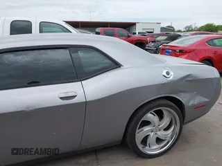 2016 Dodge Challenger SXT Plus z VIN 2C3CDZAG9GH184110, wystawiony jako IAAI lot #42463784 z przebiegiem 160 484 mil mil oraz . Historia ofert i sprzedaży dostępna na DreamBid. Obrazek 15.