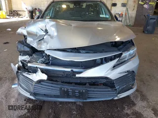 2023 Toyota Camry LE z VIN 4T1C11AK5PU127664, wystawiony jako IAAI lot #41653925 z przebiegiem 24 378 mil mil oraz . Historia ofert i sprzedaży dostępna na DreamBid. Obrazek 6.