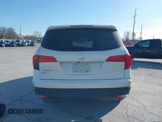 2016 Honda Pilot EX-L with VIN 5FNYF5H5XGB016152, listed as a IAAI auction lot 41820023 with 210,474 mi miles and . Bid and sale history available at DreamBid. Image 17.