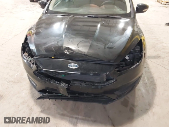 2017 Ford Focus SE with VIN 1FADP3F22HL292063, listed as a IAAI auction lot 41525805 with 104,760 mi miles and . Bid and sale history available at DreamBid. Image 6.