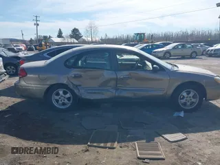 2004 Ford Taurus SE with VIN 1FAFP532X4G152810, listed as a IAAI auction lot 41639876 with 98,718 mi miles and . Bid and sale history available at DreamBid. Image 13.