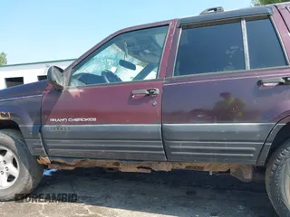 1997 Jeep Grand Cherokee Laredo with VIN 1J4GZ58S0VC708420, listed as a IAAI auction lot 42624603 with Not provided miles and . Bid and sale history available at DreamBid. Image 13.