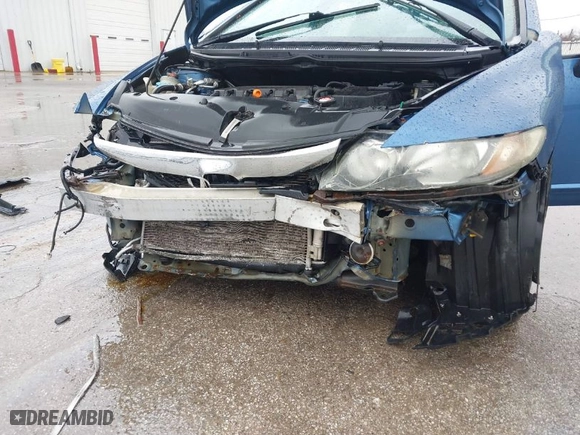 2010 Honda Civic Sdn LX with VIN 19XFA1F51AE015941, listed as a IAAI auction lot 41710847 with 133,929 mi miles. Bid and sale history available at carsss.com. Image 6.