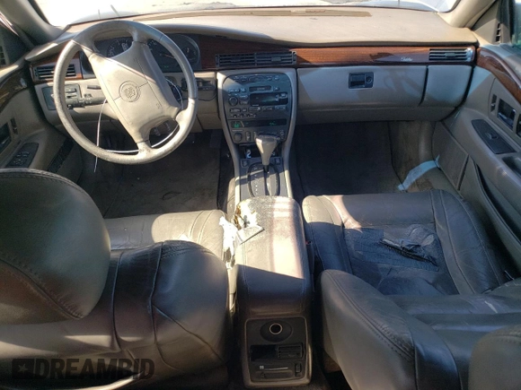 1999 Cadillac Eldorado z VIN 1G6EL12Y0XU604529, wystawiony jako Copart lot #77620004 z przebiegiem 246 032 mil mil oraz Szkoda całkowita • Salvage title. Historia ofert i sprzedaży dostępna na DreamBid. Obrazek 8.