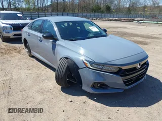2022 Honda Accord Sedan Sport SE with VIN 1HGCV1F41NA033980, listed as a IAAI auction lot 41879036 with 54,472 mi miles. Bid and sale history available at carsss.com. Image 1.