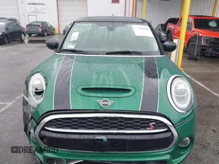 2020 MINI Hardtop Cooper S z VIN WMWXR5C08L2L85651, wystawiony jako IAAI lot #41521346 z przebiegiem 40 863 mil mil oraz . Historia ofert i sprzedaży dostępna na DreamBid. Obrazek 13.