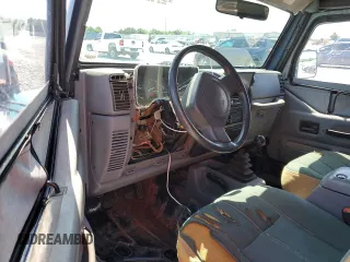 1997 Jeep Wrangler SE with VIN 1J4FY29P2VP446786, listed as a Copart auction lot 52295305 with 0 mi miles and Salvage Title. Bid and sale history available at carsss.com. Image 8.