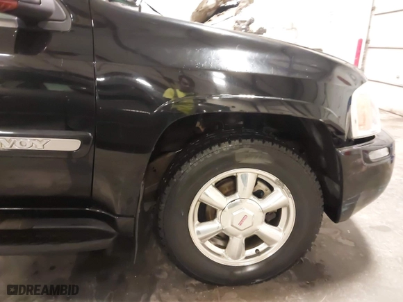 2004 GMC Envoy SLE with VIN 1GKDT13S542265104, listed as a IAAI auction lot 41884797 with 154,190 mi miles. Bid and sale history available at carsss.com. Image 6.