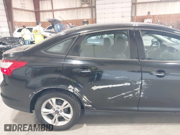 2013 Ford Focus SE with VIN 1FADP3F28DL160807, listed as a IAAI auction lot 42052971 with 60,903 mi miles. Bid and sale history available at carsss.com. Image 6.