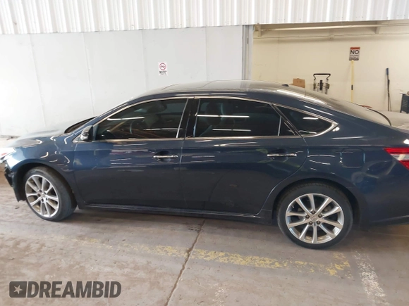 2014 Toyota Avalon Limited with VIN 4T1BK1EB1EU128987, listed as a IAAI auction lot 42034677 with 104,153 mi miles and . Bid and sale history available at DreamBid. Image 15.