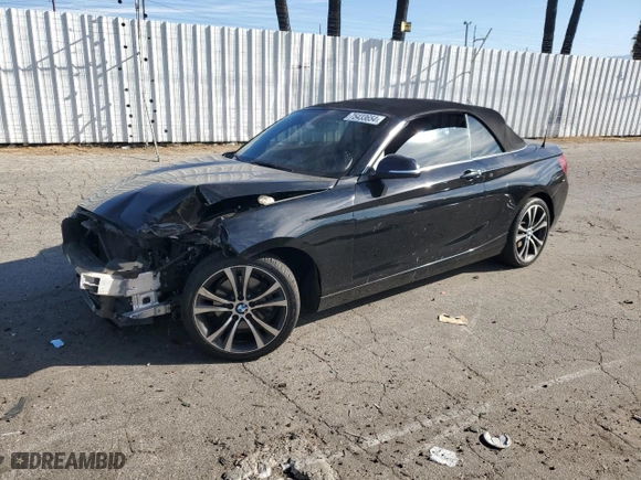 2015 BMW 2 Series 228i with VIN WBA1K5C59FV242992, listed as a Copart auction lot 75433654 with 0 mi miles and Salvage Title. Bid and sale history available at carsss.com. Image 1.