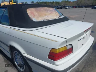 1996 BMW 3-Series 328IC with VIN WBABK8324TET92418, listed as a IAAI auction lot 41815664 with 128,661 mi miles. Bid and sale history available at carsss.com. Image 6.