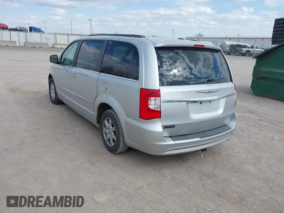 2011 Chrysler Town & Country Touring with VIN 2A4RR5DGXBR780044, listed as a IAAI auction lot 42035045 with 205,627 mi miles and . Bid and sale history available at DreamBid. Image 3.