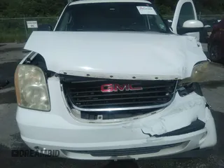 2009 GMC Yukon SLT w/4SB with VIN 1GKFC33049R272997, listed as a IAAI auction lot 39935360 with 290,952 mi miles. Bid and sale history available at carsss.com. Image 10.