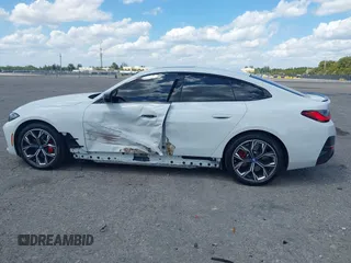 2024 BMW i4 eDrive35 z VIN WBY43AW02RFS79370, wystawiony jako IAAI lot #41887964 z przebiegiem 11 910 mil mil oraz . Historia ofert i sprzedaży dostępna na DreamBid. Obrazek 6.