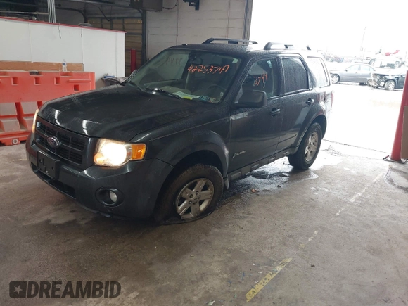2009 Ford Escape Hybrid with VIN 1FMCU49339KB19700, listed as a IAAI auction lot 42253749 with 169,299 mi miles and . Bid and sale history available at DreamBid. Image 2.
