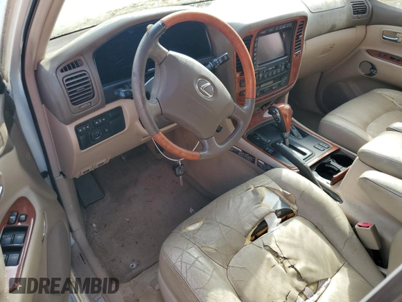 2002 Lexus LX 470 z VIN JTJHT00W623517039, wystawiony jako Copart lot #51458785 z przebiegiem 219 906 mil mil oraz Tytuł czysty. Historia ofert i sprzedaży dostępna na DreamBid. Obrazek 8.