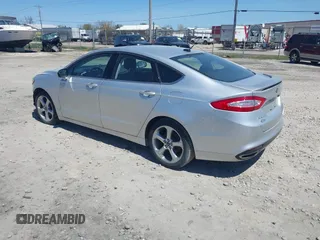 2015 Ford Fusion SE with VIN 3FA6P0H96FR135457, listed as a IAAI auction lot 42213144 with 158,151 mi miles and . Bid and sale history available at DreamBid. Image 3.