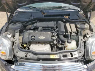2012 MINI Hardtop z VIN WMWSU3C5XCT261707, wystawiony jako Copart lot #59939565 z przebiegiem 52 509 mil mil oraz Szkoda całkowita • Salvage title. Historia ofert i sprzedaży dostępna na DreamBid. Obrazek 11.