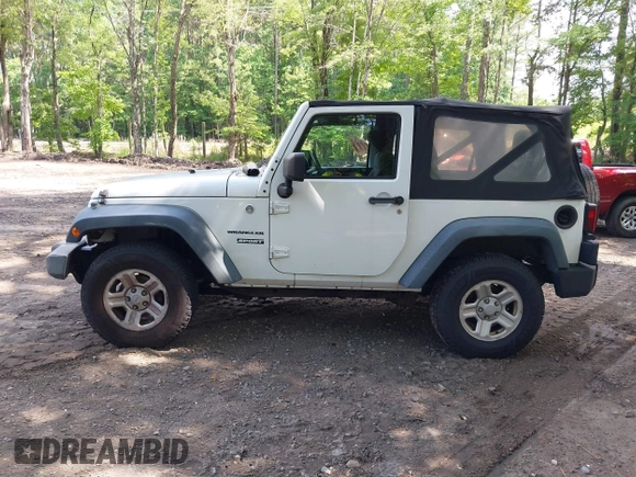 2012 Jeep Wrangler Sport with VIN 1C4AJWAG7CL192200, listed as a IAAI auction lot 42472398 with 198,999 mi miles and . Bid and sale history available at DreamBid. Image 14.