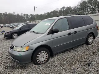 2002 Honda Odyssey LX z VIN 5FNRL18562B011805, wystawiony jako Copart lot #86796674 z przebiegiem 274 304 mil mil oraz Szkoda całkowita • Salvage title. Historia ofert i sprzedaży dostępna na DreamBid. Obrazek 1.