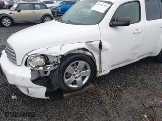 2010 Chevrolet HHR LS with VIN 3GNBAADB9AS513529, listed as a IAAI auction lot 41106312 with NaN miles. Bid and sale history available at carsss.com. Image 6.