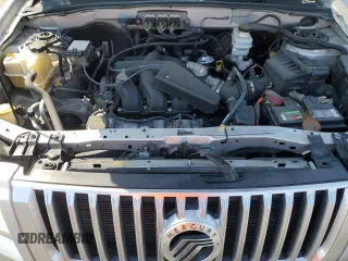 2008 Mercury Mariner z VIN 4M2CU91168KJ40089, wystawiony jako Copart lot #64688995 z przebiegiem 196 758 mil mil oraz Szkoda całkowita • Salvage title. Historia ofert i sprzedaży dostępna na DreamBid. Obrazek 12.