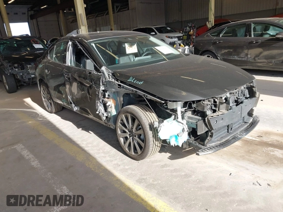 2023 Mazda 3 S Premium with VIN 3MZBPBDM5PM374492, listed as a IAAI auction lot 42025207 with 12,344 mi miles and . Bid and sale history available at DreamBid. Image 1.