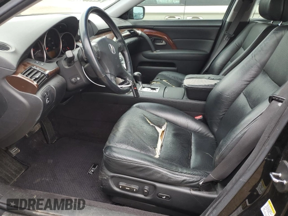2006 Acura RL z VIN JH4KB16506C011226, wystawiony jako Copart lot #53918385 z przebiegiem 200 433 mil mil oraz Szkoda całkowita • Salvage title. Historia ofert i sprzedaży dostępna na DreamBid. Obrazek 7.
