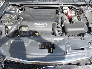 2014 Ford Taurus SHO with VIN 1FAHP2KT8EG131067, listed as a IAAI auction lot 42102086 with 107,822 mi miles. Bid and sale history available at carsss.com. Image 10.