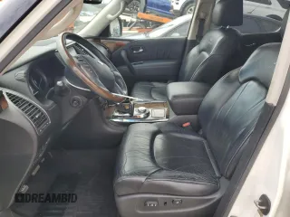 2011 Infiniti QX56 8-passenger z VIN JN8AZ2NC7B9300341, wystawiony jako Copart lot #52969675 z przebiegiem 146 118 mil mil oraz Szkody całkowita. Historia ofert i sprzedaży dostępna na DreamBid. Obrazek 7.