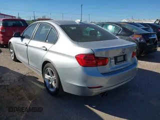 2012 BMW 3 Series 328i with VIN WBA3A5C5XCF345274, listed as a IAAI auction lot 41812072 with 142,024 mi miles. Bid and sale history available at carsss.com. Image 3.