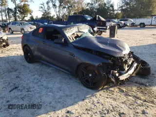 2018 BMW M2 z VIN WBS1J5C50J7B70191, wystawiony jako Copart lot #86976284 z przebiegiem Nie podano mil oraz Szkoda całkowita • Salvage title. Historia ofert i sprzedaży dostępna na DreamBid. Obrazek 4.