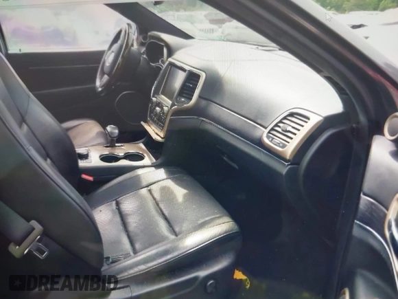 2015 Jeep Grand Cherokee Summit with VIN 1C4RJFJG0FC611768, listed as a IAAI auction lot 42468497 with 217,032 mi miles and . Bid and sale history available at DreamBid. Image 5.
