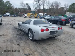 2001 Chevrolet Corvette Z06 with VIN 1G1YY12S915127617, listed as a IAAI auction lot 41620619 with 77,868 mi miles. Bid and sale history available at carsss.com. Image 3.