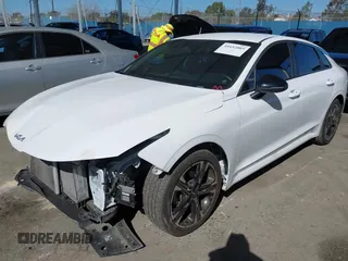 2023 Kia K5 GT-Line z VIN 5XXG64J22PG224092, wystawiony jako IAAI lot #41652803 z przebiegiem 50 326 mil mil oraz . Historia ofert i sprzedaży dostępna na DreamBid. Obrazek 2.
