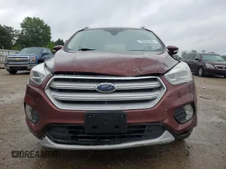 2018 Ford Escape Titanium z VIN 1FMCU0J93JUA70449, wystawiony jako Copart lot #59303245 z przebiegiem 165 907 mil mil oraz Szkoda całkowita • Salvage title. Historia ofert i sprzedaży dostępna na DreamBid. Obrazek 5.