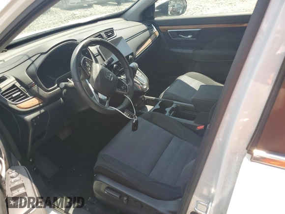 2021 Honda CR-V EX z VIN 2HKRW2H58MH673984, wystawiony jako Copart lot #59546805 z przebiegiem Nie podano mil oraz Szkoda całkowita • Salvage title. Historia ofert i sprzedaży dostępna na DreamBid. Obrazek 7.