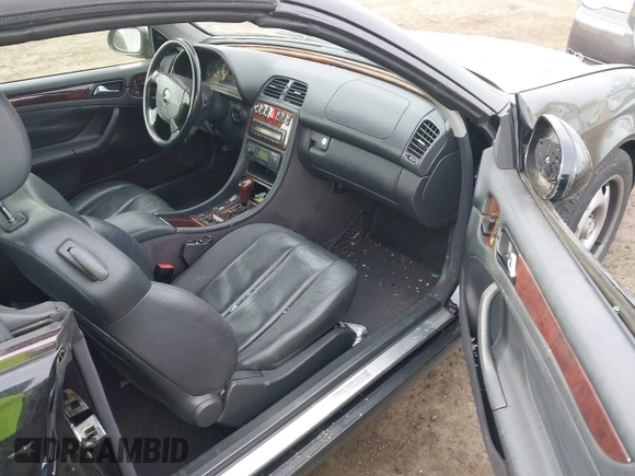 1999 Mercedes-Benz CLK with VIN WDBLK65G1XT013704, listed as a IAAI auction lot 42115880 with 85,741 mi miles. Bid and sale history available at carsss.com. Image 5.