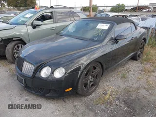 2007 Bentley Continental GT with VIN SCBDR33W67C046257, listed as a IAAI auction lot 41661440 with 54,229 mi miles and . Bid and sale history available at DreamBid. Image 2.