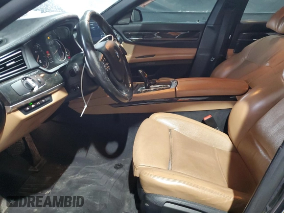 2015 BMW 7 Series 750Li xDrive z VIN WBAYF8C57FD653916, wystawiony jako Copart lot #52864275 z przebiegiem 138 811 mil mil oraz Szkoda całkowita • Salvage title. Historia ofert i sprzedaży dostępna na DreamBid. Obrazek 7.