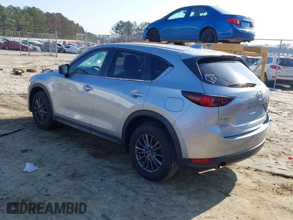 2020 Mazda CX-5 Touring with VIN JM3KFACM8L0727393, listed as a IAAI auction lot 41492627 with 91,521 mi miles. Bid and sale history available at carsss.com. Image 3.