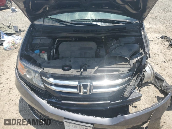 2014 Honda Odyssey EX-L with VIN 5FNRL5H62EB112280, listed as a Copart auction lot 60138645 with 167,657 mi miles and Salvage title. Bid and sale history available at DreamBid. Image 12.