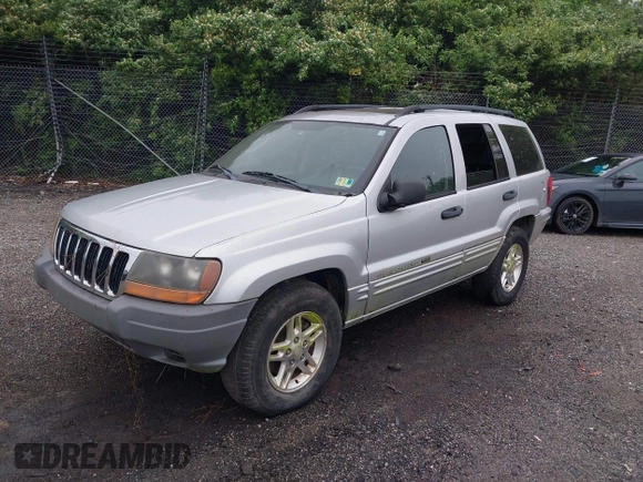 2004 Jeep Grand Cherokee Laredo with VIN 1J4GW48N34C145956, listed as a IAAI auction lot 42201114 with 137,815 mi miles and . Bid and sale history available at DreamBid. Image 2.