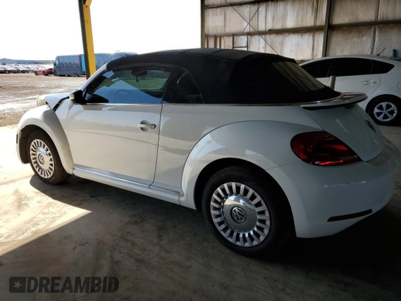 2013 Volkswagen Beetle 2.5L with VIN 3VW5P7AT2DM811768, listed as a Copart auction lot 54609125 with 60,505 mi miles and Salvage Title. Bid and sale history available at DreamBid. Image 2.