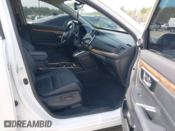 2020 Honda CR-V Touring z VIN 2HKRW2H9XLH623380, wystawiony jako IAAI lot #42039028 z przebiegiem 59 795 mil mil oraz . Historia ofert i sprzedaży dostępna na DreamBid. Obrazek 5.