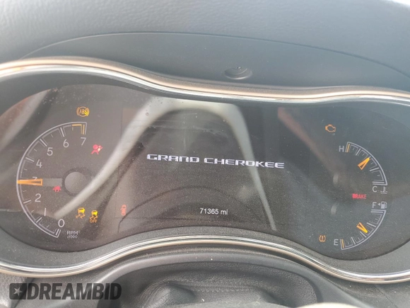 2017 Jeep Grand Cherokee Laredo with VIN 1C4RJEAG7HC740779, listed as a Copart auction lot 56483825 with 71,365 mi miles and Salvage title. Bid and sale history available at DreamBid. Image 9.