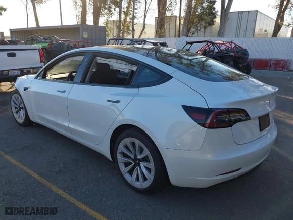 2023 Tesla Model 3 with VIN 5YJ3E1EA4PF421933, listed as a IAAI auction lot 41369120 with 21,914 mi miles. Bid and sale history available at carsss.com. Image 3.