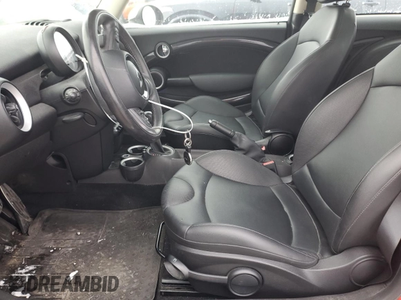 2013 MINI Hardtop S with VIN WMWSV3C56DT389389, listed as a Copart auction lot 89288615 with 85,001 mi miles and Salvage title. Bid and sale history available at DreamBid. Image 7.